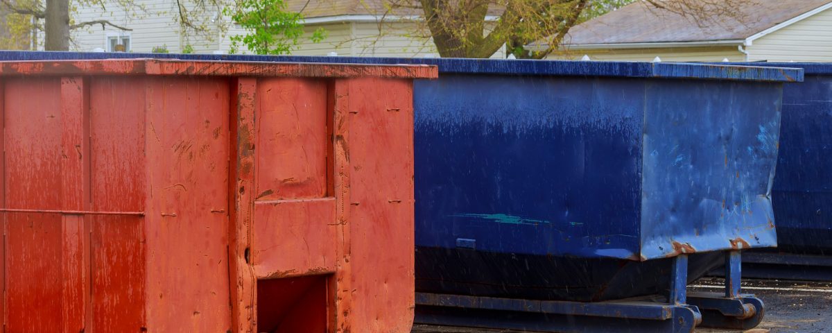 Industrial garbage container on construction site